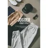 Ścieki torowe Mężczyźni luźne zwykłe wysokiej jakości mody dresowe jogger wysokiej jakości teksturę merkletyczne spodnie SI980559 201118