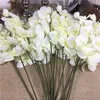 20 pçs/lote Atacado ramos de orquídeas brancas Flores artificiais para decoração de festa de casamento orquídeas flores baratas