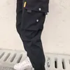 Pantaloni cargo con tasche grandi Pantaloni streetwear larghi a vita alta Pantaloni tattici larghi pantaloni hip hop di alta qualità 220226