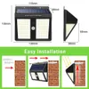 庭の道の装飾のための太陽LEDの屋外のセキュリティライト2200mAhの作業12時間のモーションセンサー防水太陽の壁のランプ