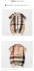 Bébé garçons Plaid barboteuse enfant en bas âge enfants Plaid revers simple boutonnage manches courtes combinaisons concepteur infantile Onesie nouveau-né tissu décontracté 7246216