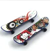 Brinquedo infantil 9 5cm dedo skate material plástico ponta do dedo skate mini presente crianças039s scooter de dedo brinquedos2188068458