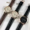 2021 high quality OMG fashion men's watch solid color simple style dial display calendar with buckle belt260o