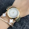 Montres de marque de mode pour femmes et filles, Style cristal, bracelet en acier et métal, Quartz avec Logo, montre-bracelet AR 12