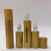 5ml 10ml contêineres essenciais vazios de óleo de bambu natural perfume fragrância de aço rolos de aço frascos para salão de viagem em casa