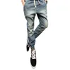 Оптовые - мода мужчины разорванные джинсовые брюки повседневные мужские пробежки мужские байкер джинсы брюки гарема корейской тонкий подходящий хип-хоп человек