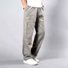 Pantaloni kaki da uomo estivi taglia grande vestibilità dritta taglie grandi 5XL tasche laterali gamba larga pantaloni cargo neri in cotone pantaloni da lavoro uomo 211201