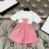 屋外の女の赤ちゃんプリンセスドレス春秋の子供の格子縞のドレスターンダウンカラースカート子供服