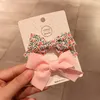 Set di fermagli per becco d'anatra per bambini con fiocco floreale e clip laterali con frangia carina