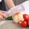 Type de stockage multifonctionnel Zesters outils pour fruits et légumes couteau à éplucher avec Tube de stockage pour concombre, carotte, pomme ménage