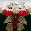 Orecchini Collana 2021 Fantastici set di gioielli con fiori in oro e cristallo rosso Perline africane Set da sposa ABH491