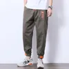 メンズパンツ2021メンズハーレムファッション服バギーヒップホップジョガーズ韓国風の革師のズボン男性のテクニカウェアのための男性の貨物