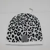 Svart checkerboard kvinnor beanie par gata dans hip hop check leopard tryck kall hatt män damer trendig varm ullhatt