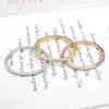 Nuovo design Gioielli in acciaio inossidabile 18 K 4 file Braccialetti di cristallo Bracciale stereo con geometria color oro per le donne che amano i regali