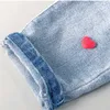 Jesienne dziewczyny Dżinsy koreańskie Wersja Małe i średnie Dekoracje Miłości Spodnie Sportowe Dżinsowe Spodnie Mid-Waist Dzieci 210625