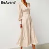 BeAvant Elegant spring satin bishop sleeve a-line dress women V-neck high waist button dress solid Vintage long dresses chic 210709