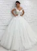 2021 Elegant Tulle Princess Wedding Dresses Sheer Neck Cap ärmar Spets Applique Brudklänning med bakknappar Robe de Mariage 328 328