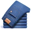 Shan Bao осень осень зима установлена ​​прямая растяжка джинсовые джинсы классический стиль значок молодежь мужская деловая случайные джинсы брюки 211009