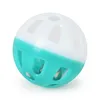 Pet Toy Hollow Plastic Pet Cat Dog Colorful Ball Toy med liten klocka älskvärd klocka röst plast plast interaktiv tinkle valp papegoja spela leksak