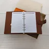 19 cm 14cm Agenda Note Book Cover äkta läderdagbok läder med dammväska fakturakort Obs Books Fashion Style Gold Ring Design2337