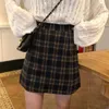 Vintage mujer Retro Plaid falda cintura alta estampado minifalda moda coreana Harajuku Oficina señora fiesta longitud media Sexy faldas 210712