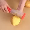 Tipo di stoccaggio multifunzionale Zester Utensili per frutta e verdura Coltello per sbucciare con tubo di stoccaggio per cetriolo, carota, mela Famiglia