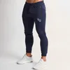 مصمم اللياقة البدنية Jogger sweatpants الذكور كمال الاجسام اللياقة السراويل الرجال القطن أزياء متعددة الجيوب تدريب كمال الاجسام الركض السراويل