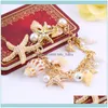 Charm Jewelrycharm Bilezikler Kadın Moda Okyanus Tarzı Çok Denizyıldızı Deniz Yıldızlı Kabuk Simüle Pearl Zinciri Plajı Bileklik Bileklik roman