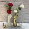 keramiek vaas nordic stijl gouden hand vaas bloemen moderne thuis kantoor decor van creatieve bloemen samenstelling woonkamer ornament 211103