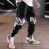 Cor Bolso Bolso Patchwork Carga Juntos Homens Graffiti Hip Hop Letra Imprimir Harem Calças Mens Calças de Dança Casuais Sweetpants 210930