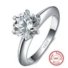 Lyx 100% 925 Sterling Silver 2ct Round Cut Simulerad Diamant Bröllop Förlovning Cocktail Kvinnor CZ Ringar Fina Smycken Partihandel