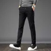 Tendencia de la moda pantalones casuales para hombres Pantalones de pies pequeños Otoño e invierno Elástico todo-fósforo Cintura elástica Pantalones largos de color sólido 210531