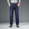 Shan Bao otoño invierno equipado recto estiramiento denim jeans estilo clásico insignia juventud hombres negocios casual jeans pantalones 211009