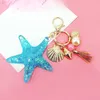 Neue Fantasie Cartoon Sea World Pearl Shell Starfish Keychain Pentagram Kristall Schlüsselanhänger Damen Tasche Auto Key Legierung Anhänger Schmuck J0306