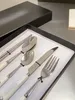 Fashion Sets Sets Signage Knife Fork Puffs i łyżki 5 sztuk 1 zestaw klasyczny 304 Materiał ze stali nierdzewnej na domowe hotel restauracyjny biuro obiadowe biuro