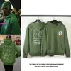 女性のための緑のセーター