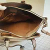 Haumea Mahlna High Handbags M55029 dragkedja på väskan riktiga läderväskor M55030 Qynf 1d8r