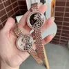 Il marchio di moda guarda il bellissimo orologio da polso C63304y con cinturino in metallo in acciaio stile leopardo di cristallo colorato da ragazza da donna