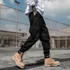 Cool Man Jogger Camouflage Tasche laterali Pantaloni sportivi da uomo stile sciolto Moda High Street Pantaloni casual Mens Streetwear Pantaloni T200319