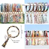 Mode Frauen Quasten Armbänder Armreif PU Leder Party Wrap Schlüsselanhänger Leopard Lilie Druck Schlüsselbund Armband Sonnenblumen Tropfen Öl Kreis Schlüssel Halter Ketten Armband