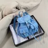 7A Nylondesigner Mini ryggsäck unisex fast färg multi pocket messenger ryggsäckar dragskolväska