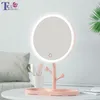 miroir de vanité ronde avec des lumières