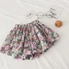 Daisy Skirt Pantskirt Menina Tutu Shorts Adorável Verão Estilo Estrangeiro Estrangeiro Algodão Largo Pants Pants Bebê Mini Flor Daisy Kid Roupas WMQ604