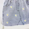 Девушки джинсовые юбки отверстия с поясом сумка девочка мода дырки юбки малыша детская одежда детская юбка для девочек носить 210331