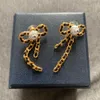 Brand Fashion Bowknot Jewelry Gold Color Rose Flower Earrings Camellia Earrings Tassel Leather Design Wedding Party Earrings6573568