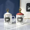 Kupalar Yaratıcı Güzel Sevimli Büyük Gözler Tasarım Avrupa Cappuccino Latte Kahve Fincanı Kapaklı Cafe Bar Yüksek dereceli Kemik Seramik Çay Kupa Ev