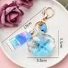 Starfish Keychain Creativity Quicksand Sequin Key Ring Party Favor Soltek Laser Leather Strap Pendant Mew Keychains Bag&Car Pendants Decorate 8Colors WMQ1292