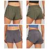 Yoga andningsbara korta byxor outfit 10 färger dolda blixtlås med fickficka kvinnors sport shorts lösa andas andas av sportkläder träning fitness slitage s1204