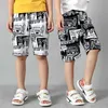 Koreaanse baby korte zomer peuter jongen shorts kleding mode katoen tiener strand broek kinderen gebreid zwart / wit 4-14T 210622