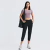 Elastic Lulu Pocket Yoga Leggins Pants z pęczką stóp Capris Solid Kolor Running Fitness Gym Ubrania Kobiety sportowe joggery